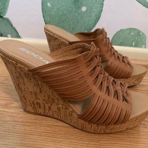 Wedges never worn. Sticker still on the bottom